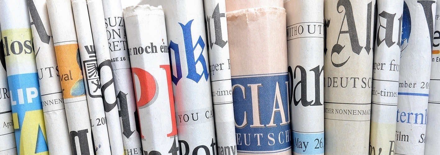 a stack of newspapers